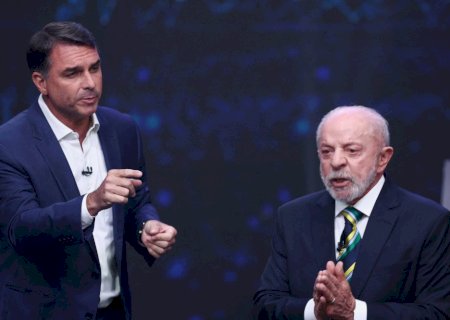 Lula expôs Flávio em casos de corrupção, e senador acertou ao deixar petista 'visivelmente irritado', avaliam aliados